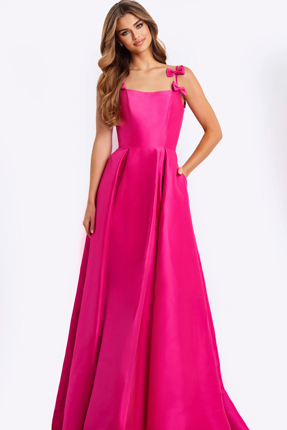 Jovani 46468 Candy pink A-line prom dress with bow straps and elegant pleated skirt.