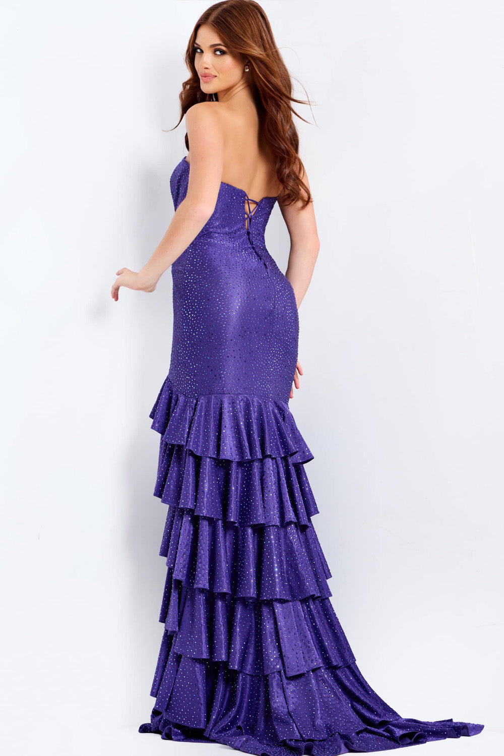 Jovani 46909 Purple mermaid prom dress with tiered ruffles and a lace-up back.