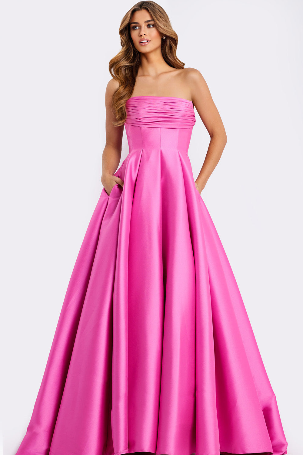 Jovani 47570 Strapless pink ballgown with pockets and a pleated bodice, perfect for prom prom dress.