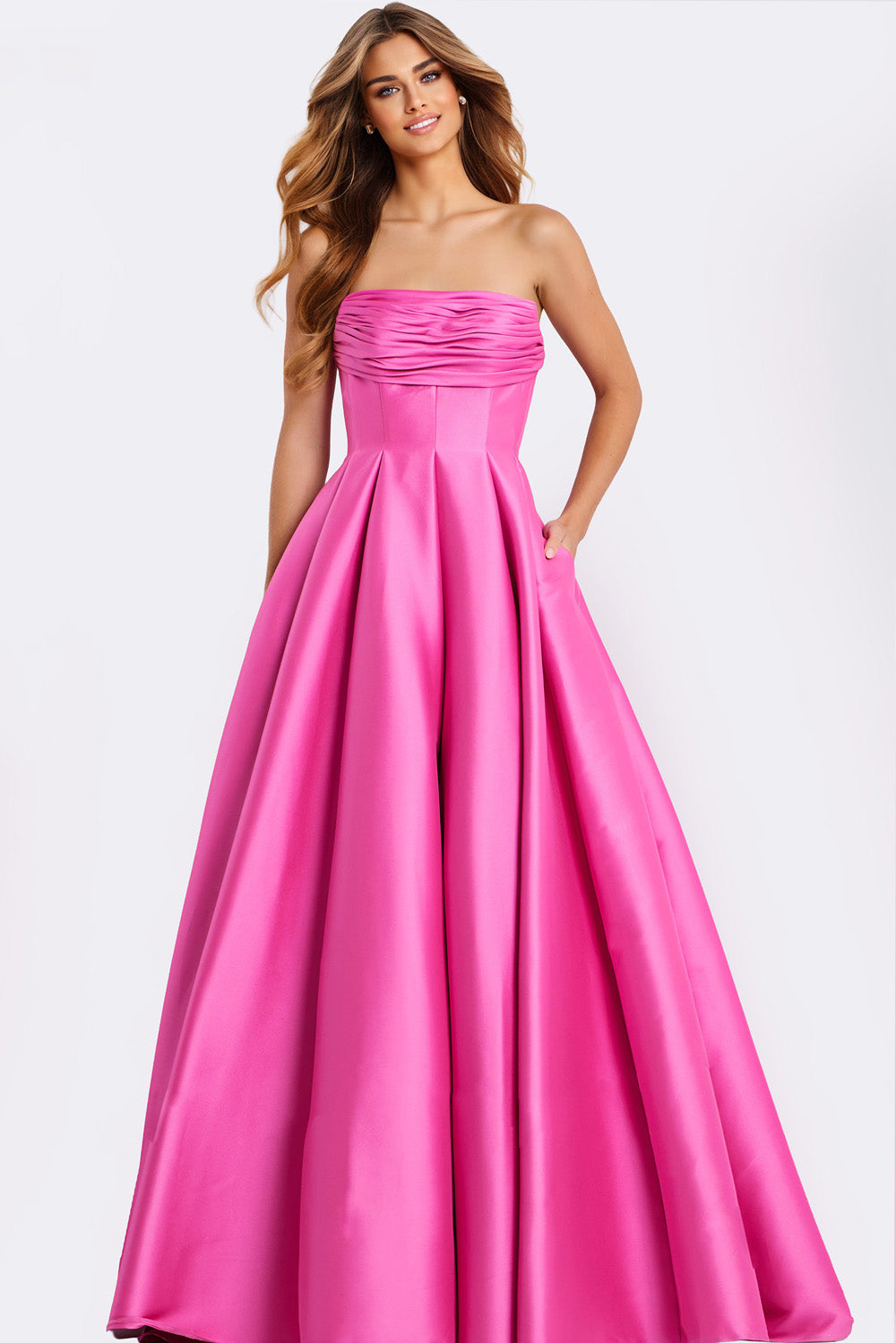Jovani 47570 Strapless pink ballgown with pleats and a flattering silhouette for prom prom dress.