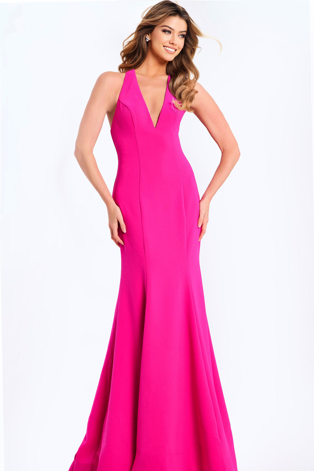 Jovani 47639 Fuchsia mermaid prom dress with a plunging neckline and fitted silhouette.