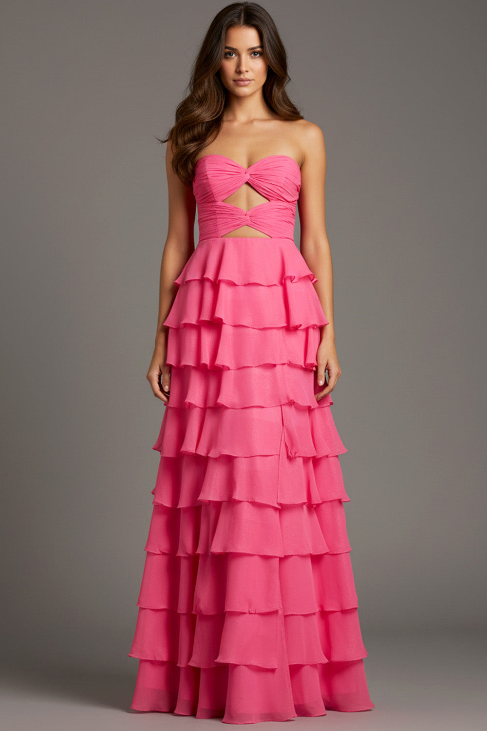 Jovani 47898 Pink strapless prom dress with layered ruffles and a cut-out detail.