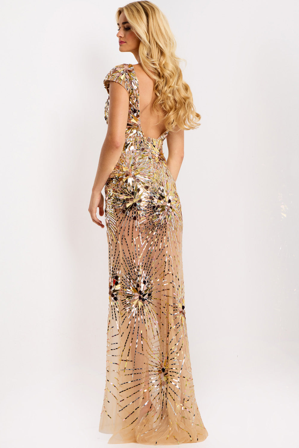 Jovani 48051 Nude formal gown with sequins and a low back, showcasing a fitted silhouette.