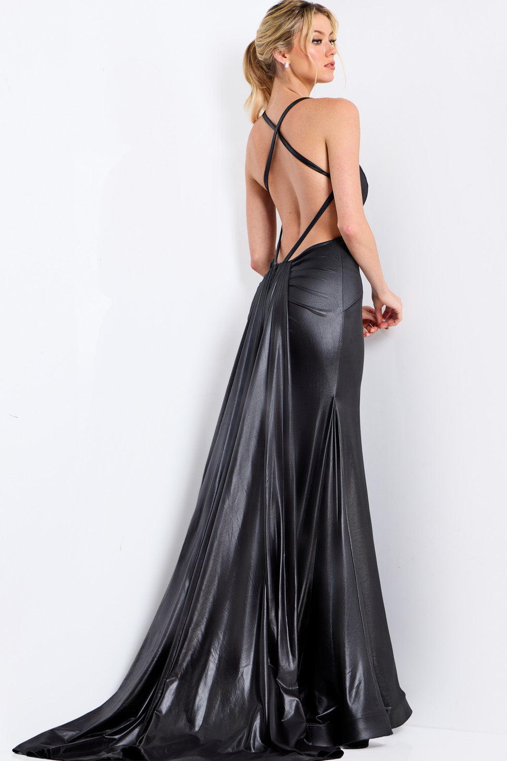 Jovani 48291 Black mermaid prom dress with a stunning lace-up back and flowing train.