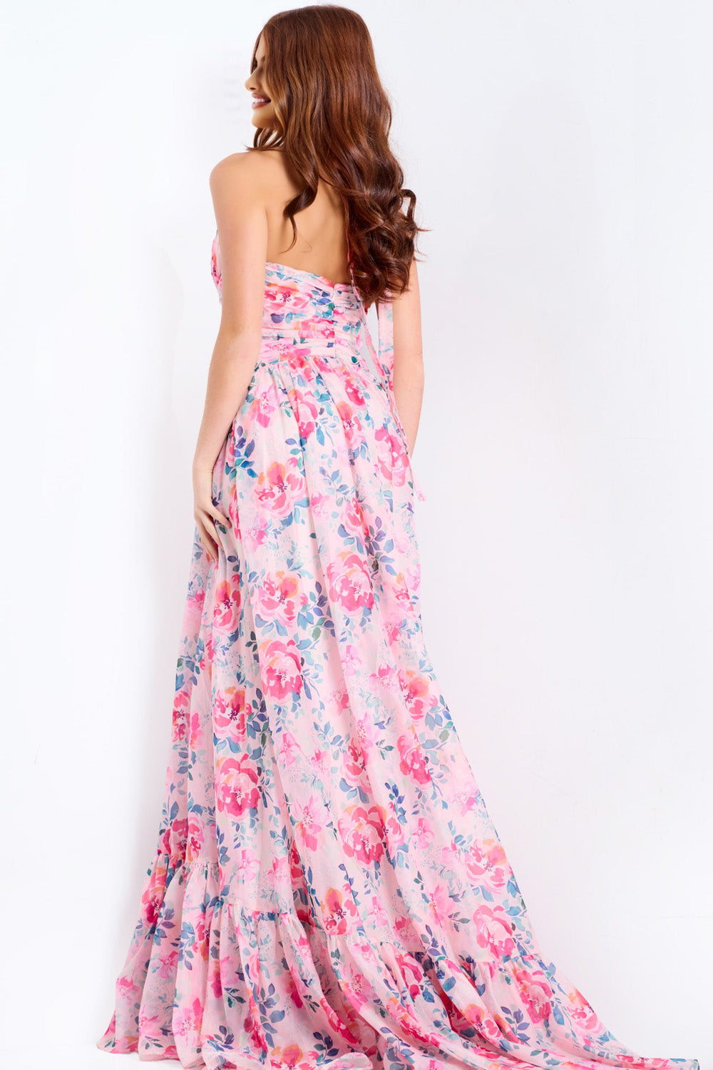 Jovani 48469 Pink floral prom dress with a fitted bodice and ruffled hem, back view.