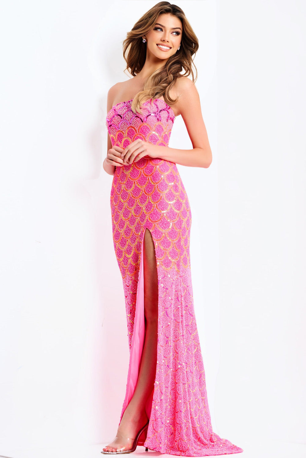 Jovani 48620 Fuchsia mermaid prom dress with a thigh-high slit and intricate beading.