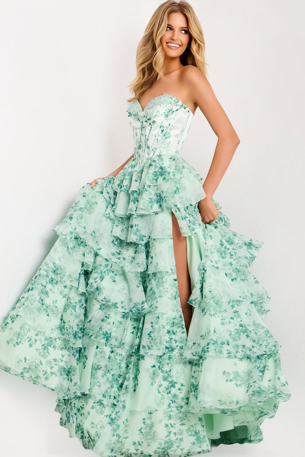 Jovani 48772 Blush and green floral prom dress with a fitted bodice and high slit, front view.