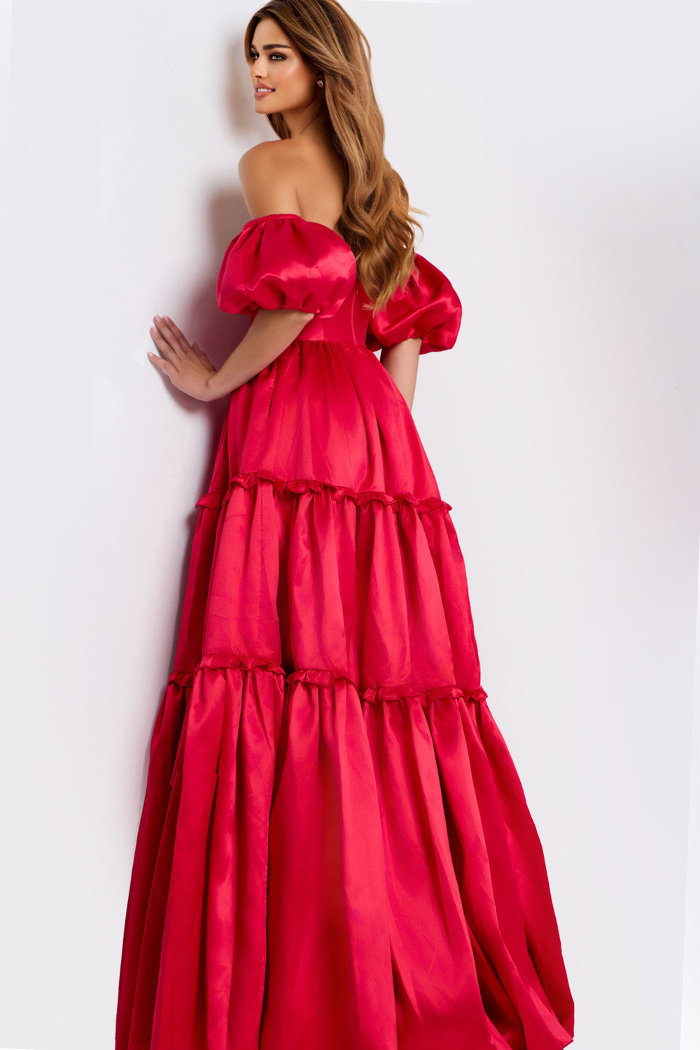 Jovani 49055 Red off-the-shoulder ballgown with tiered ruffles and a side slit, back view prom dress.