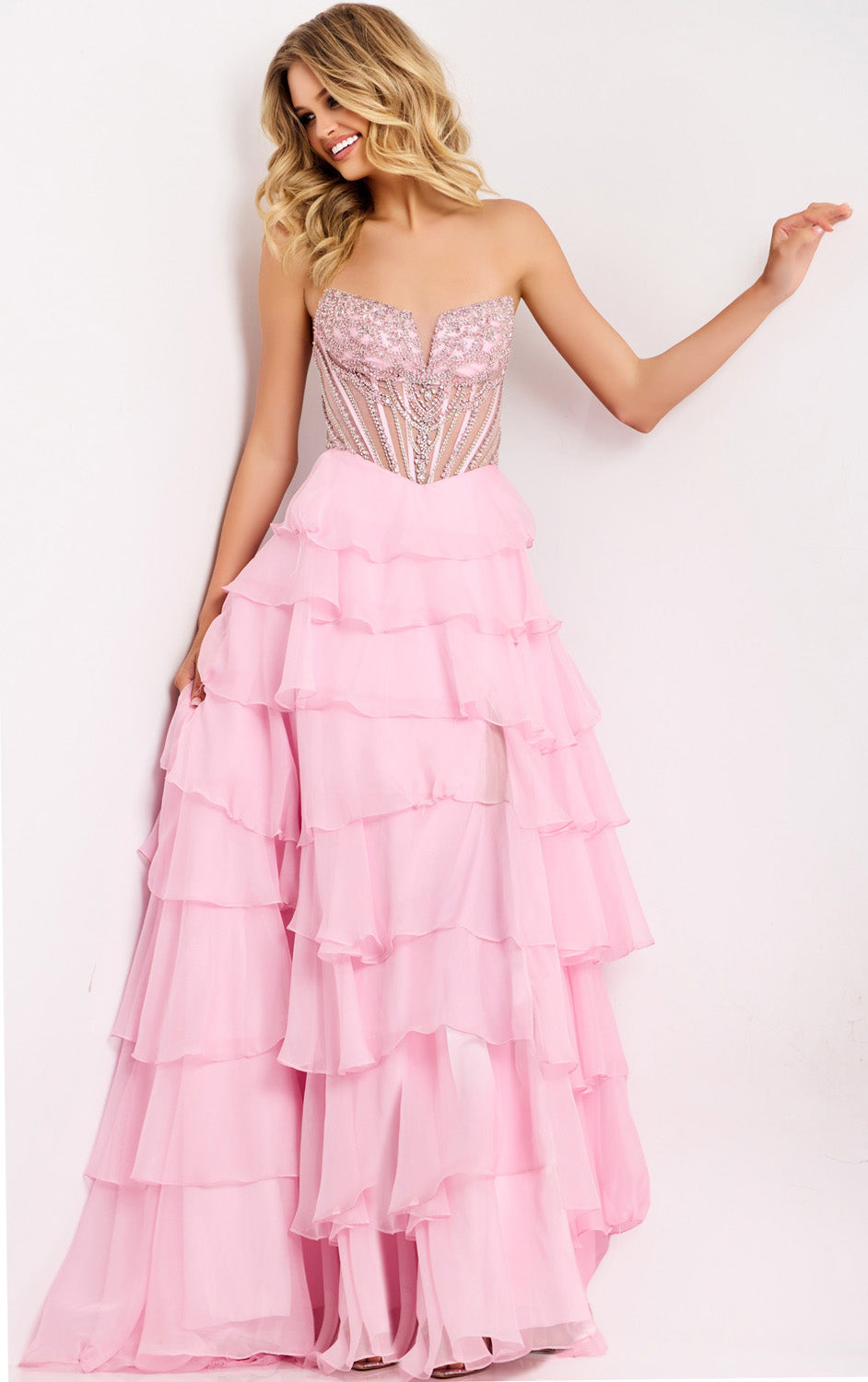 Jovani 49109 Light pink strapless prom dress with tiered ruffles and beaded bodice.