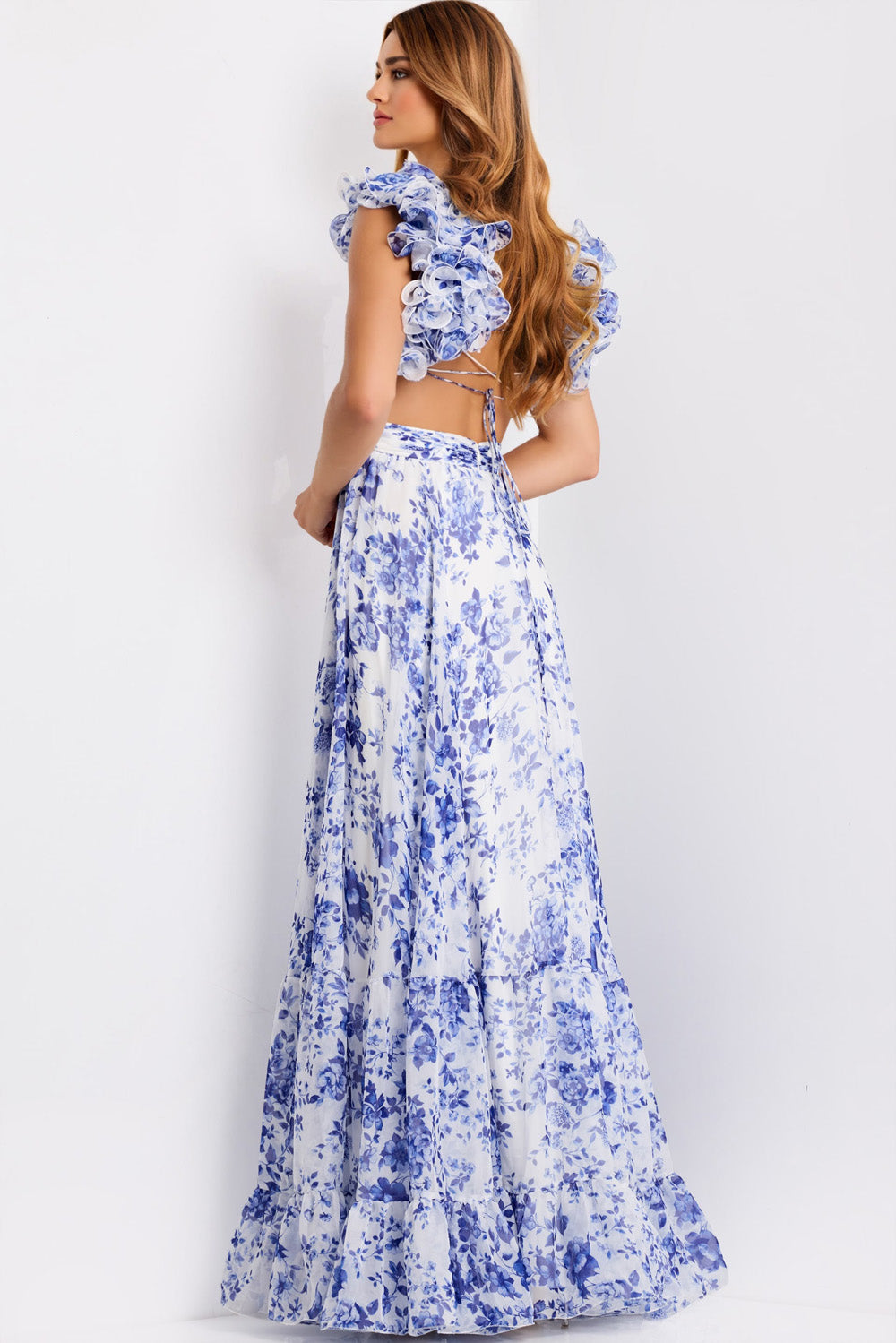 Jovani 49143 White and blue floral A-line prom dress with ruffled sleeves and lace-up back.