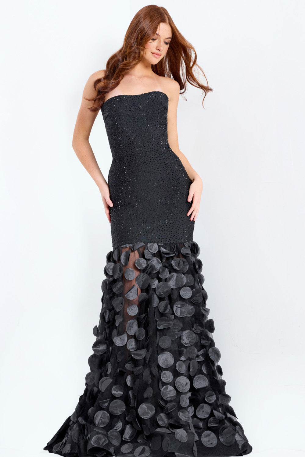 Jovani 49344 Black mermaid prom dress with beading and a dramatic ruffled hem.