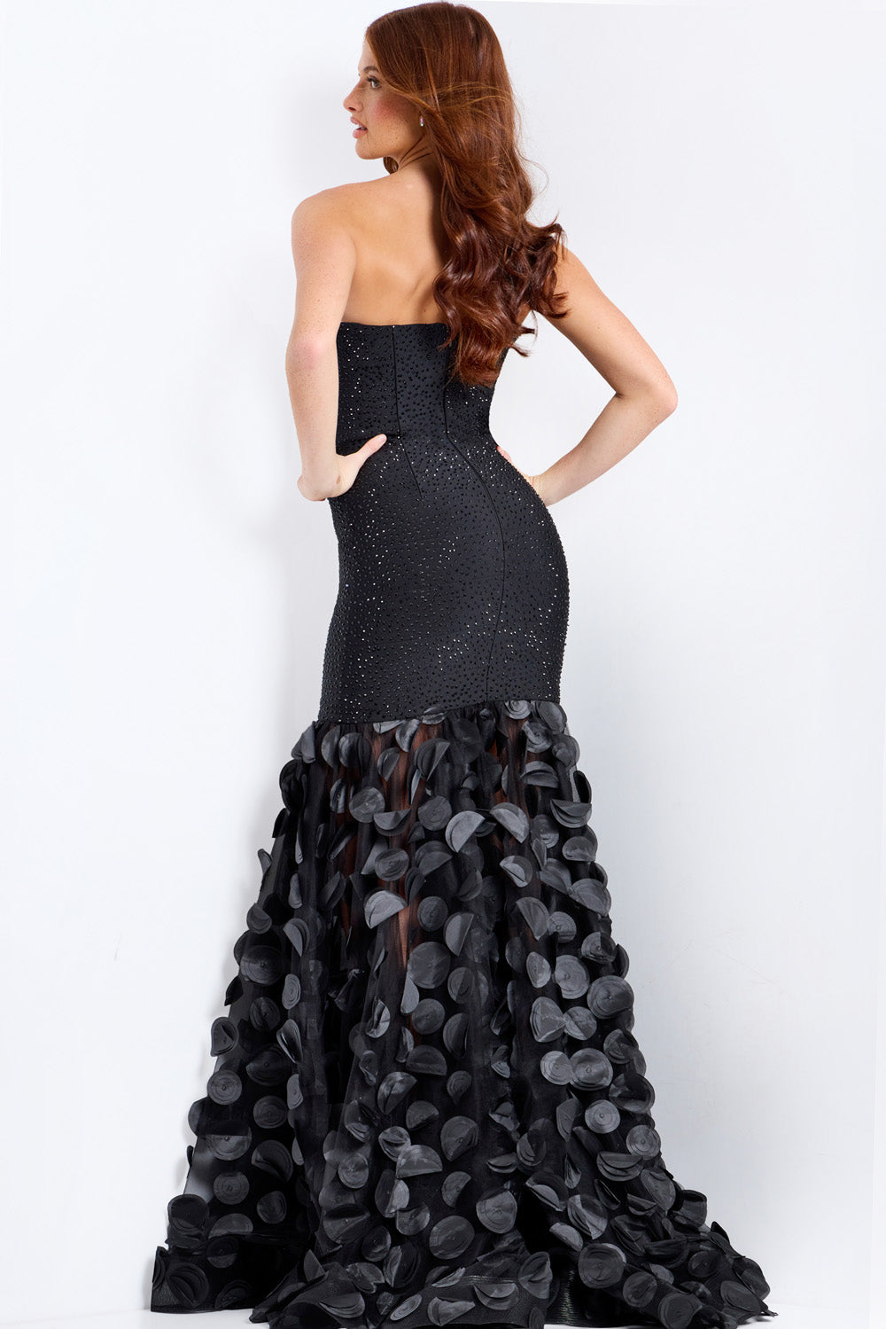 Jovani 49344 Black mermaid prom dress with a stunning lace-up back and layered ruffle skirt.