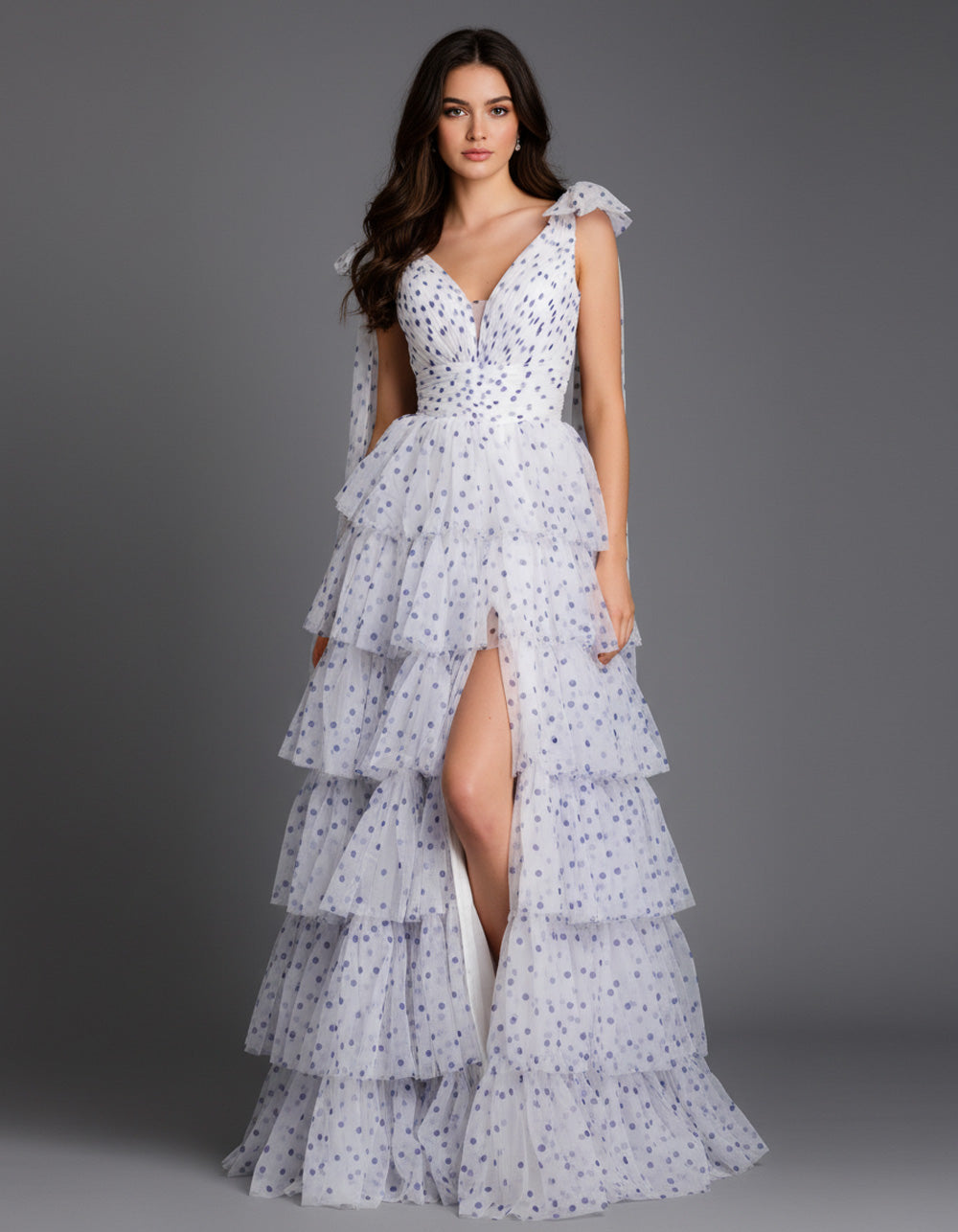 Jovani 49358 Off white and purple tiered prom dress with a high slit and ruffled straps.