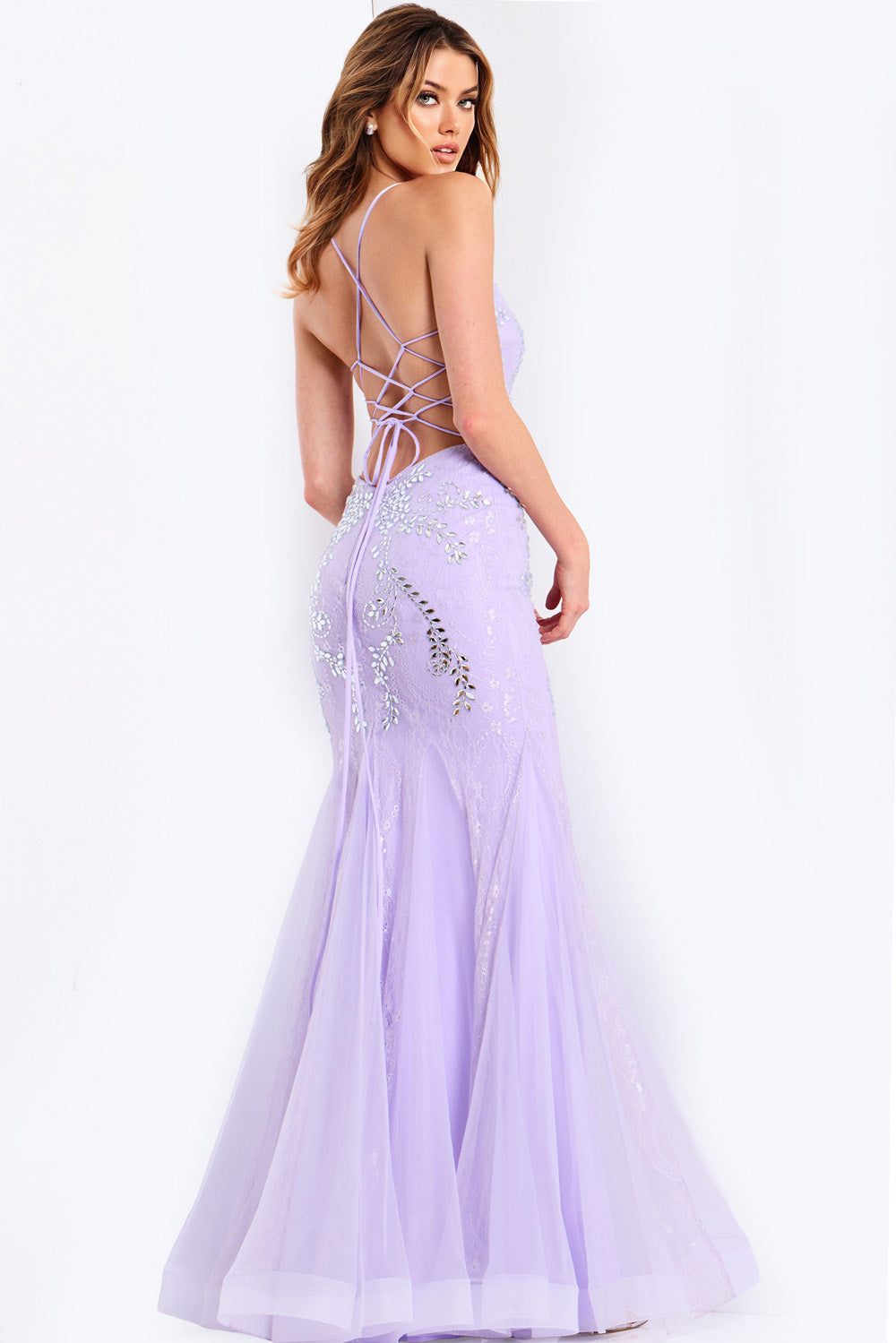 Jovani 49660 Lilac silver mermaid prom dress with a lace-up back and intricate beading, back view.