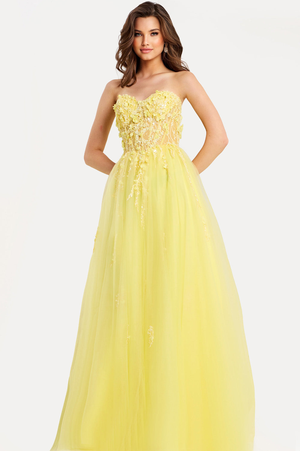Jovani 49704 Strapless yellow prom dress with floral beading and a flowing A-line silhouette.