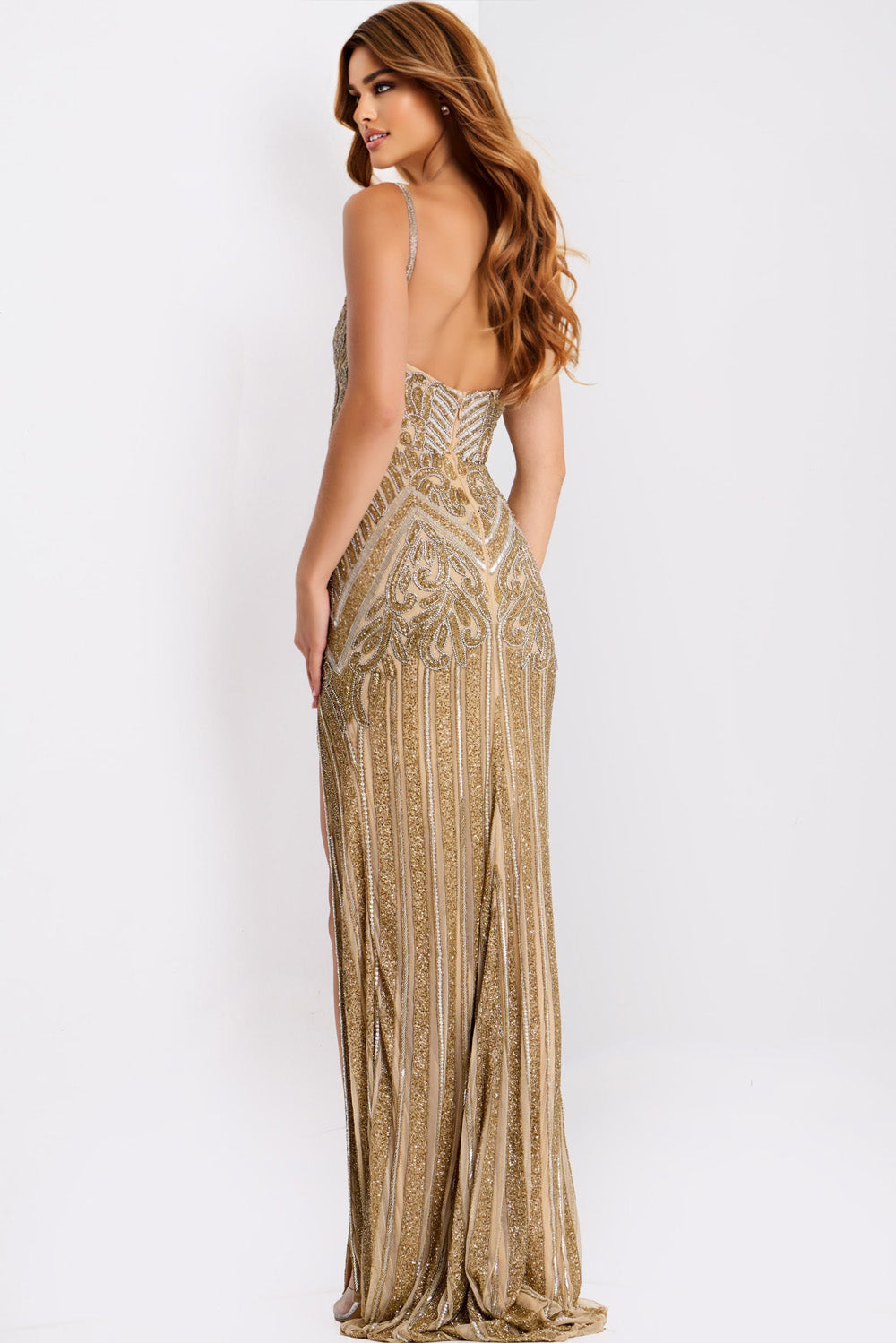 Jovani 49810 Nude gold fitted prom dress with intricate beading and a backless design.