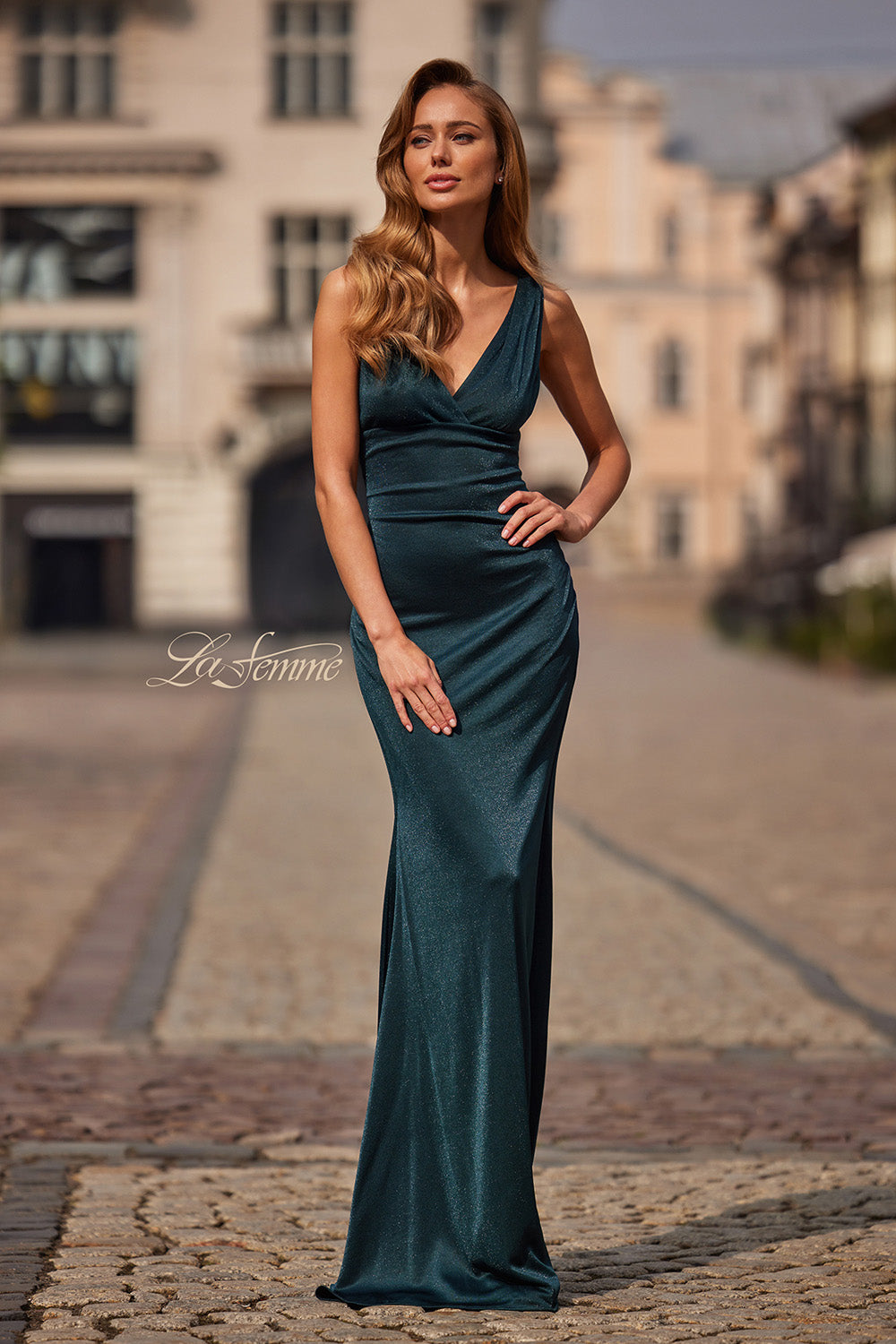 La Femme 33425 Dark teal fitted prom dress in metallic jersey with a plunging neckline.