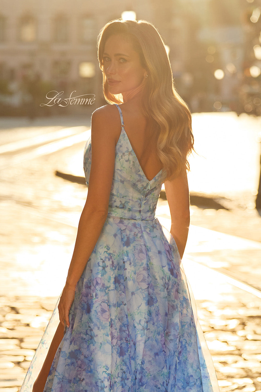 La Femme 33502 Multi-colored prom dress in print organza with a side slit and V-back design.