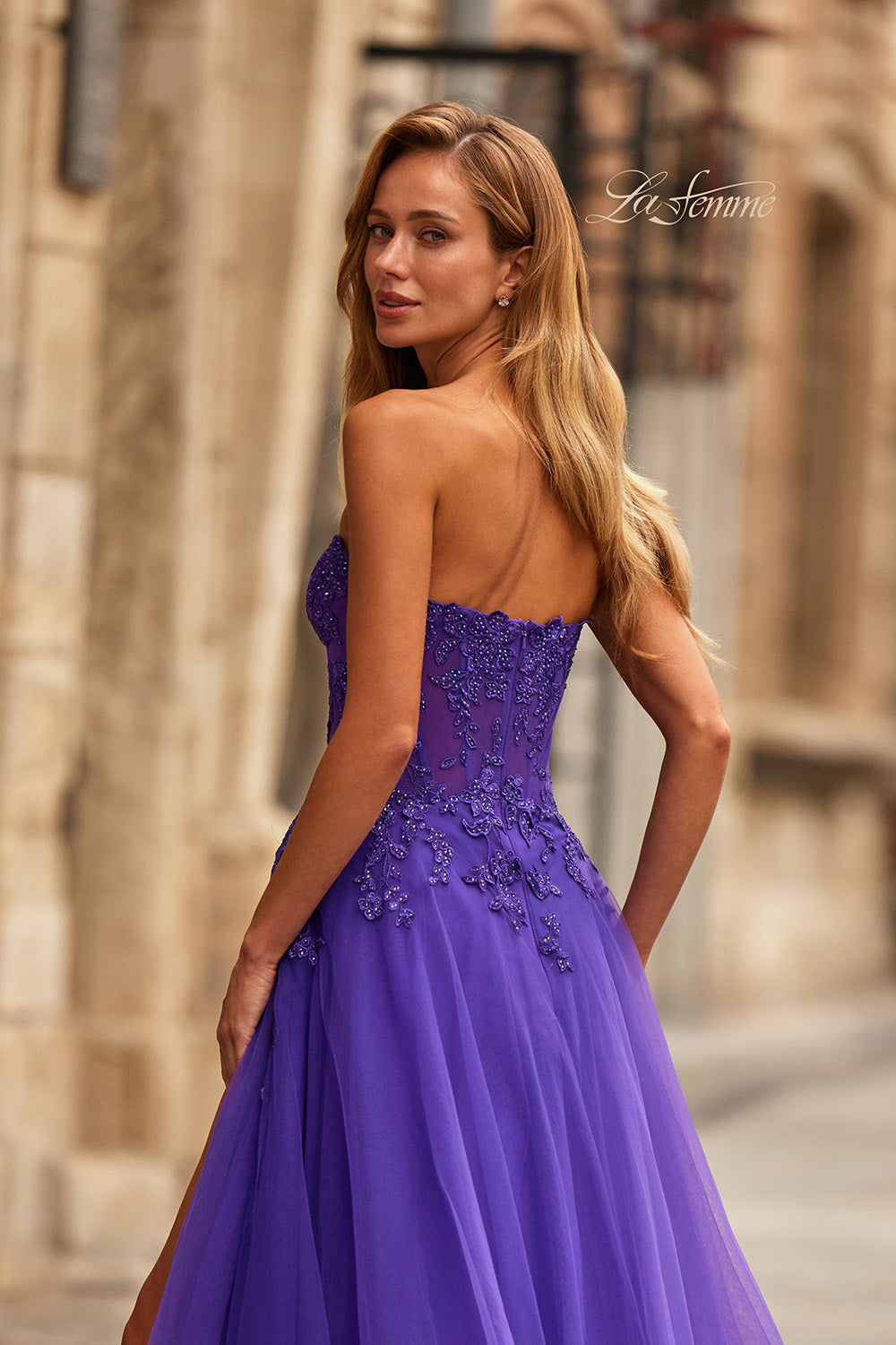 La Femme 33551 Royal purple formal gown with lace detailing and a fitted bodice, back view.