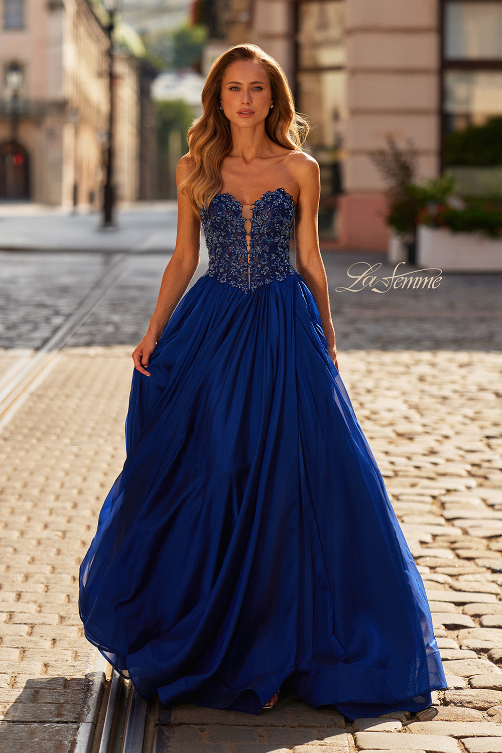 La Femme 33552 Marine blue A-line prom dress with beaded bodice and flowing skirt.