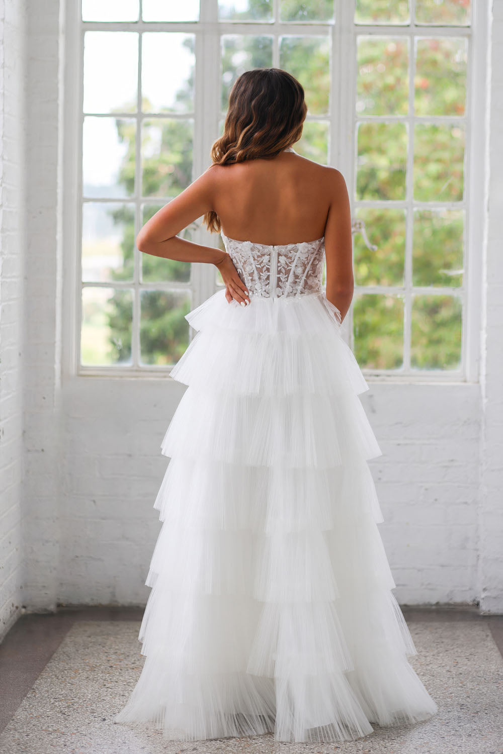 Miah Vega 24505 prom dress images. Miah Vega 24505 is available in these colors: Black, Light Blue, Light Pink, White.