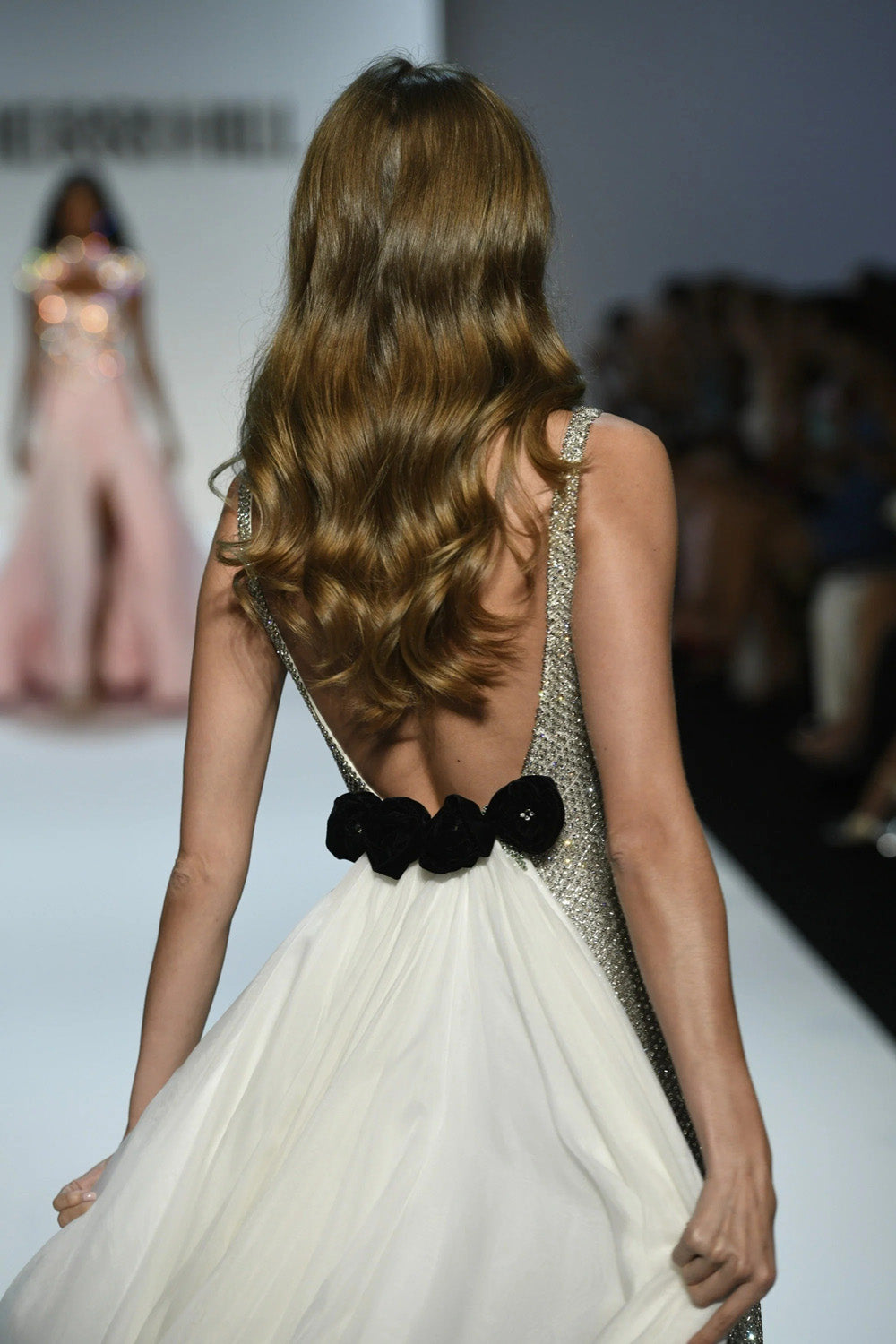 Sherri Hill 46522v ivory black all over beaded fitted column gown with sweeping ivory overskirt front runway view