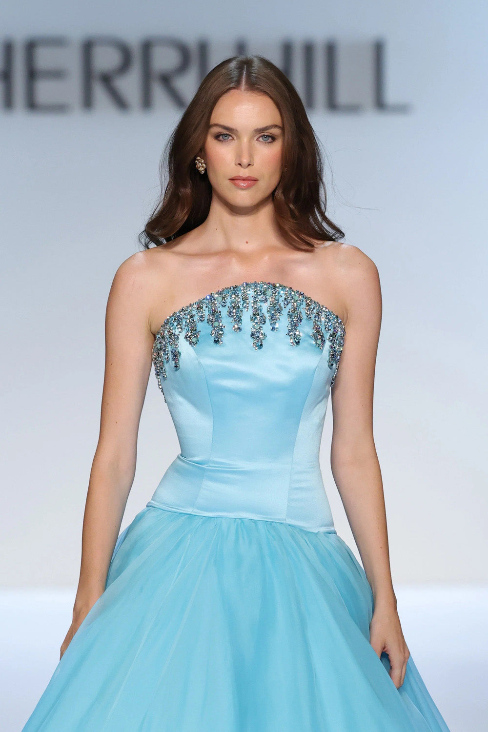 Sherri Hill 46729 aqua strapless satin ball gown with cascading beaded neckline embellishment close up view