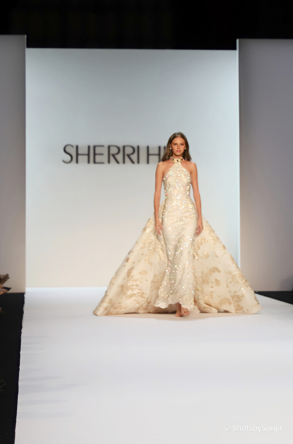 Sherri Hill 46751 ivory gold structured floral jacquard overskirt with beaded mermaid inner gown