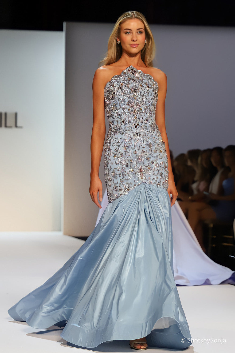 Sherri Hill 46752 sky beaded couture mermaid gown with voluminous taffeta skirt sweeping the runway floor