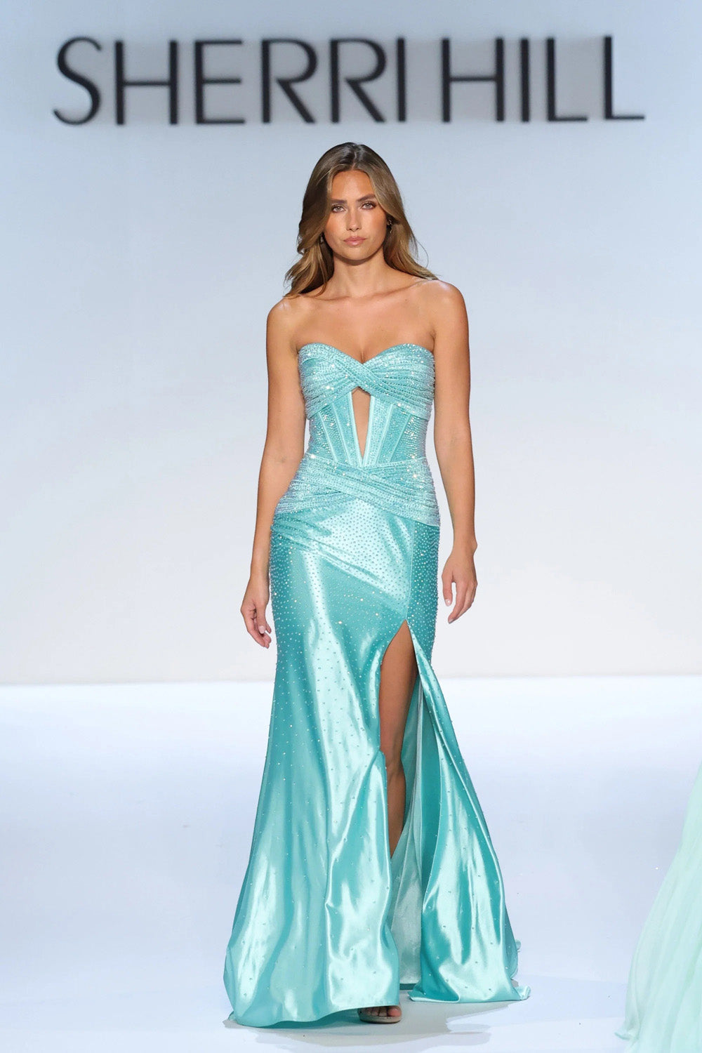 Sherri Hill 58678 light green strapless beaded mermaid gown with sweetheart neckline ruched hip and front slit train