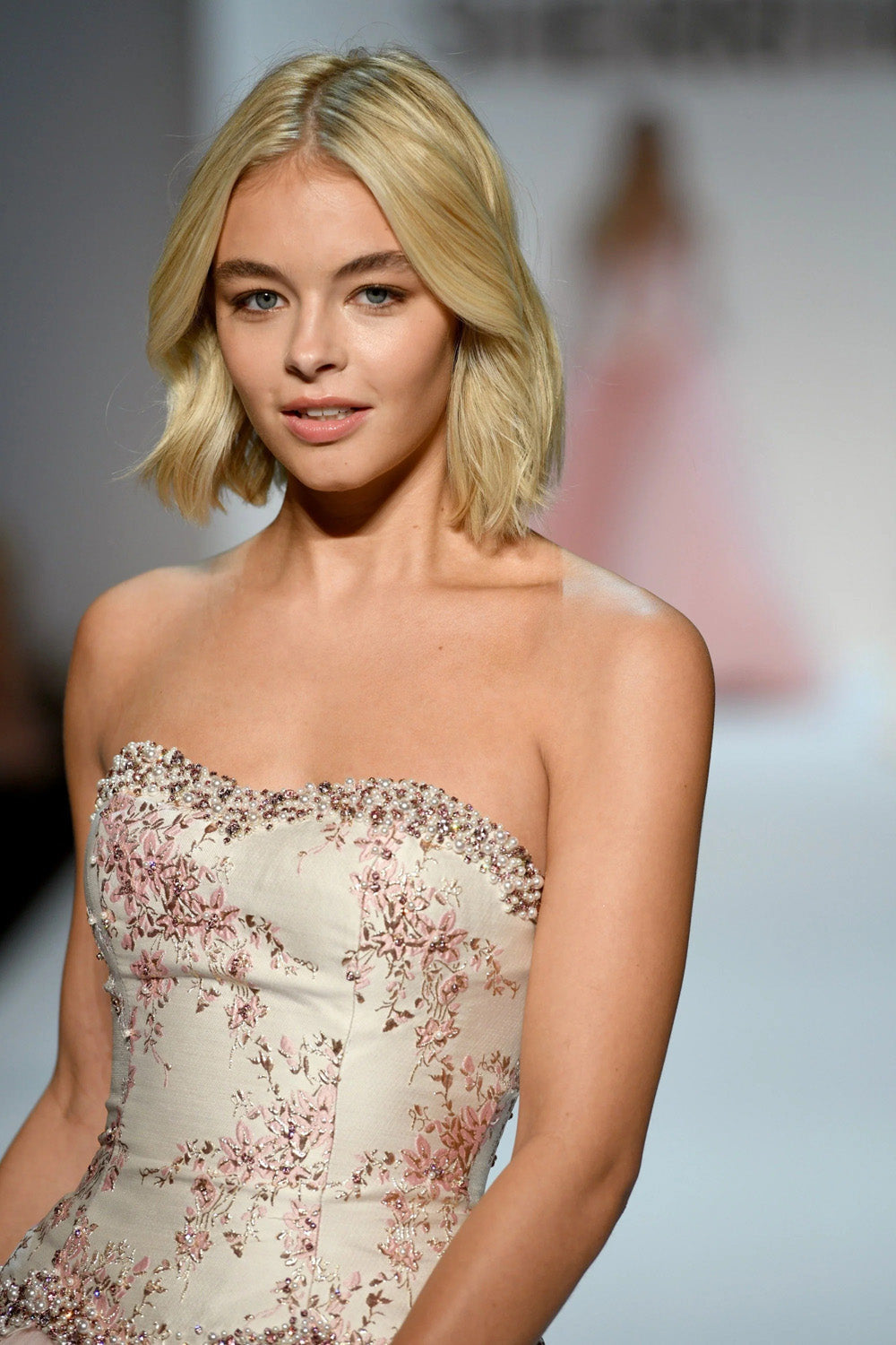 Close up of Sherri Hill 58808 pink gold print beaded sweetheart neckline with floral embroidery on champagne satin corset bodice