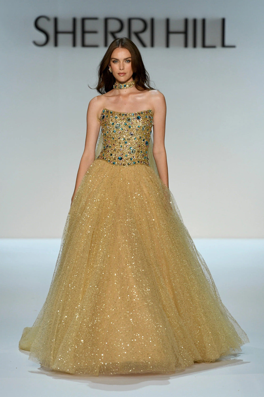 Sherri Hill 58932 nude gold multi full length strapless ballgown with stone embellished bodice on runway