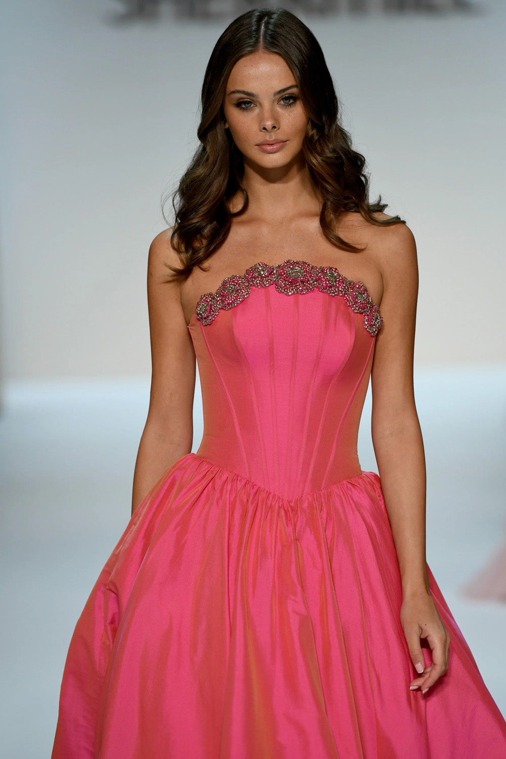 Sherri Hill 67229 bright fuchsia corset bodice close up with floral beaded applique along sweetheart neckline