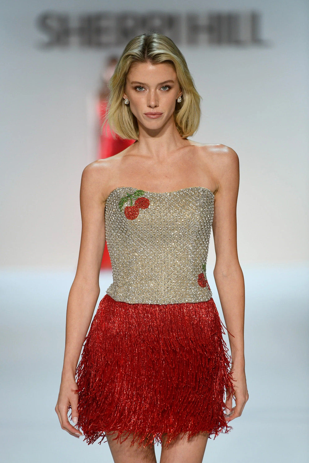Sherri Hill 67305 silver red beaded strapless dress with cherry applique and layered red fringe skirt runway front