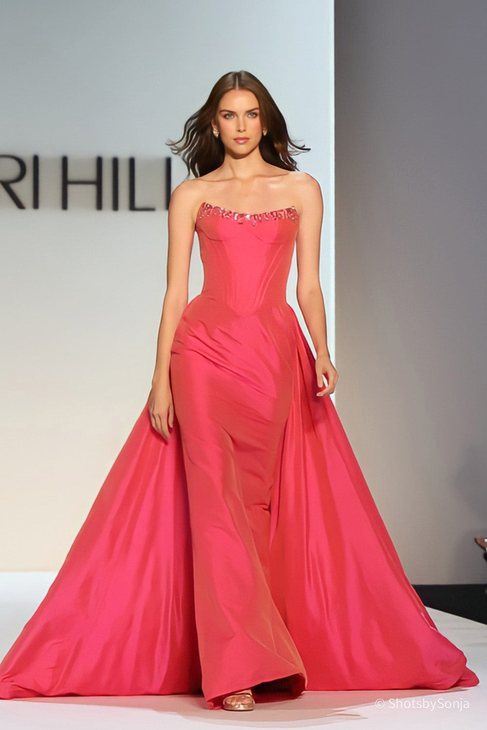 Sherri Hill 67327 in coral, strapless corset bodice with beaded neckline and full ball gown skirt, front view