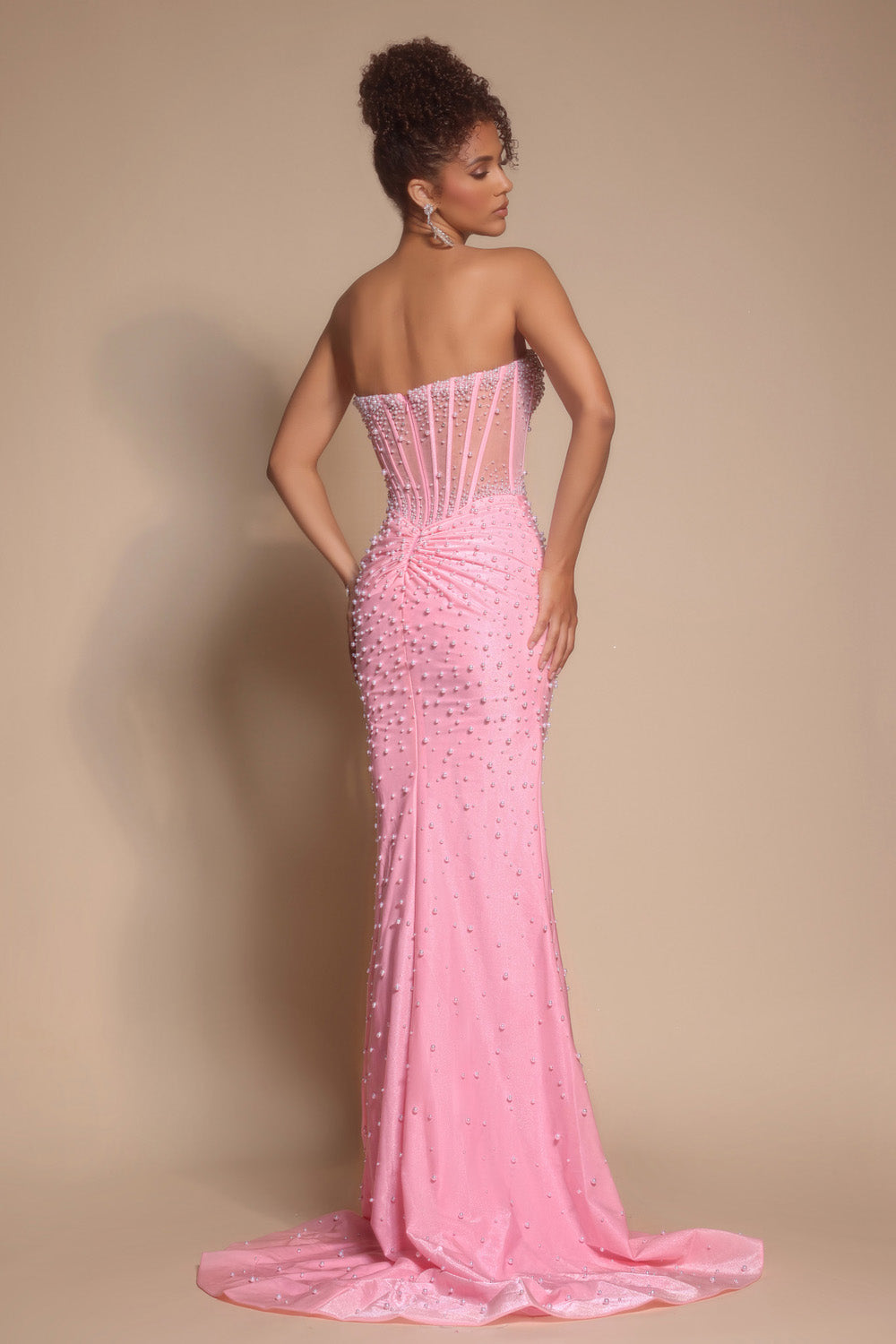 Portia and Scarlett PS26002 Pink mermaid prom dress with beading and lace-up back, back view.