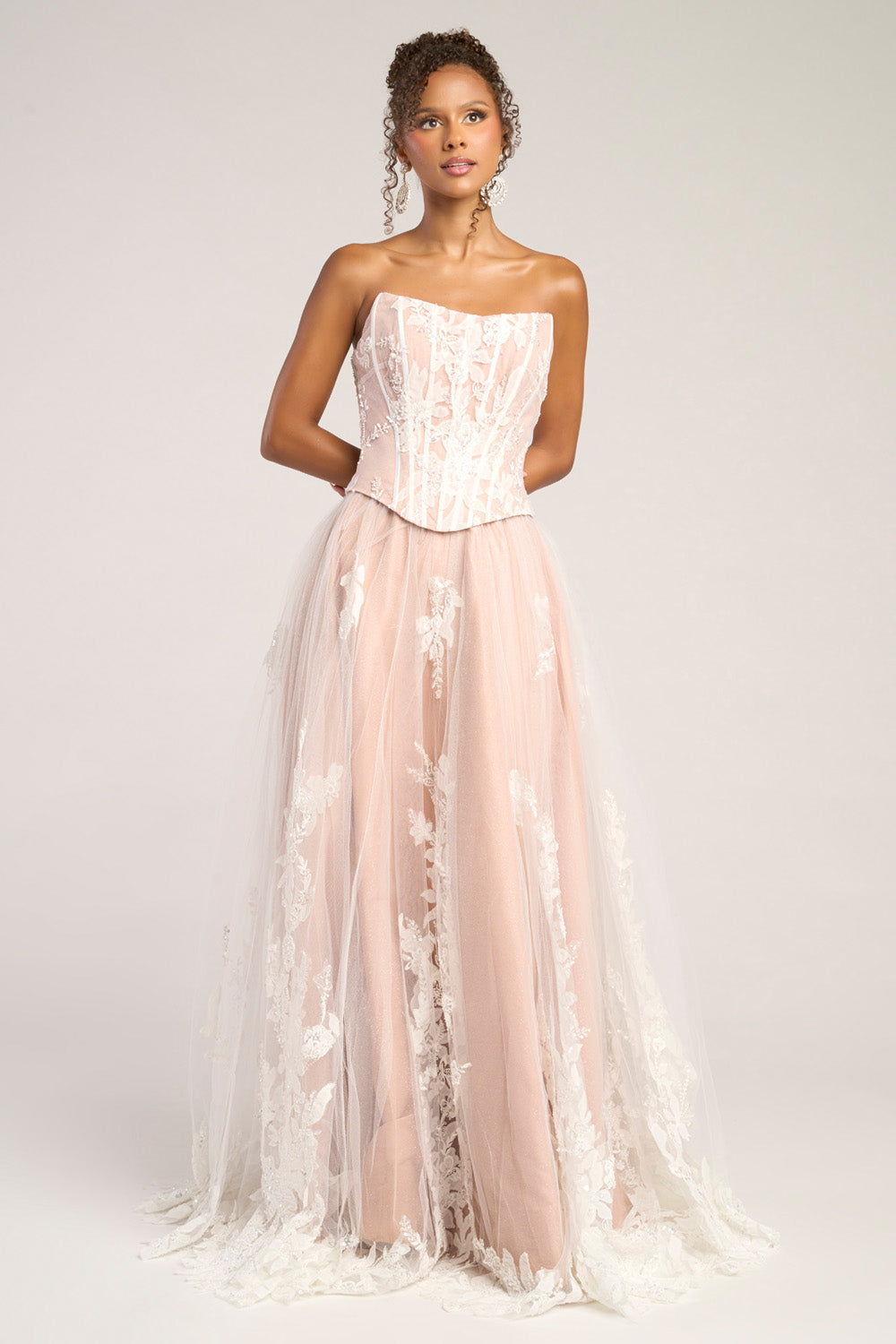 Portia and Scarlett PS26061 Strapless ivory nude prom dress with floral lace and a flowing tulle skirt.