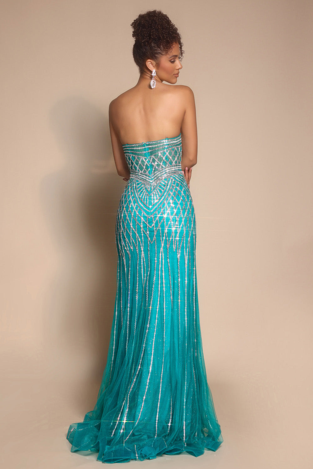 Portia and Scarlett PS26072 Peacock mermaid prom dress with intricate beading, back view.