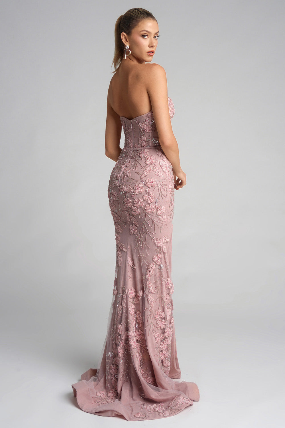 Portia and Scarlett PS26074 Pink mermaid prom dress with intricate floral beading, back view.