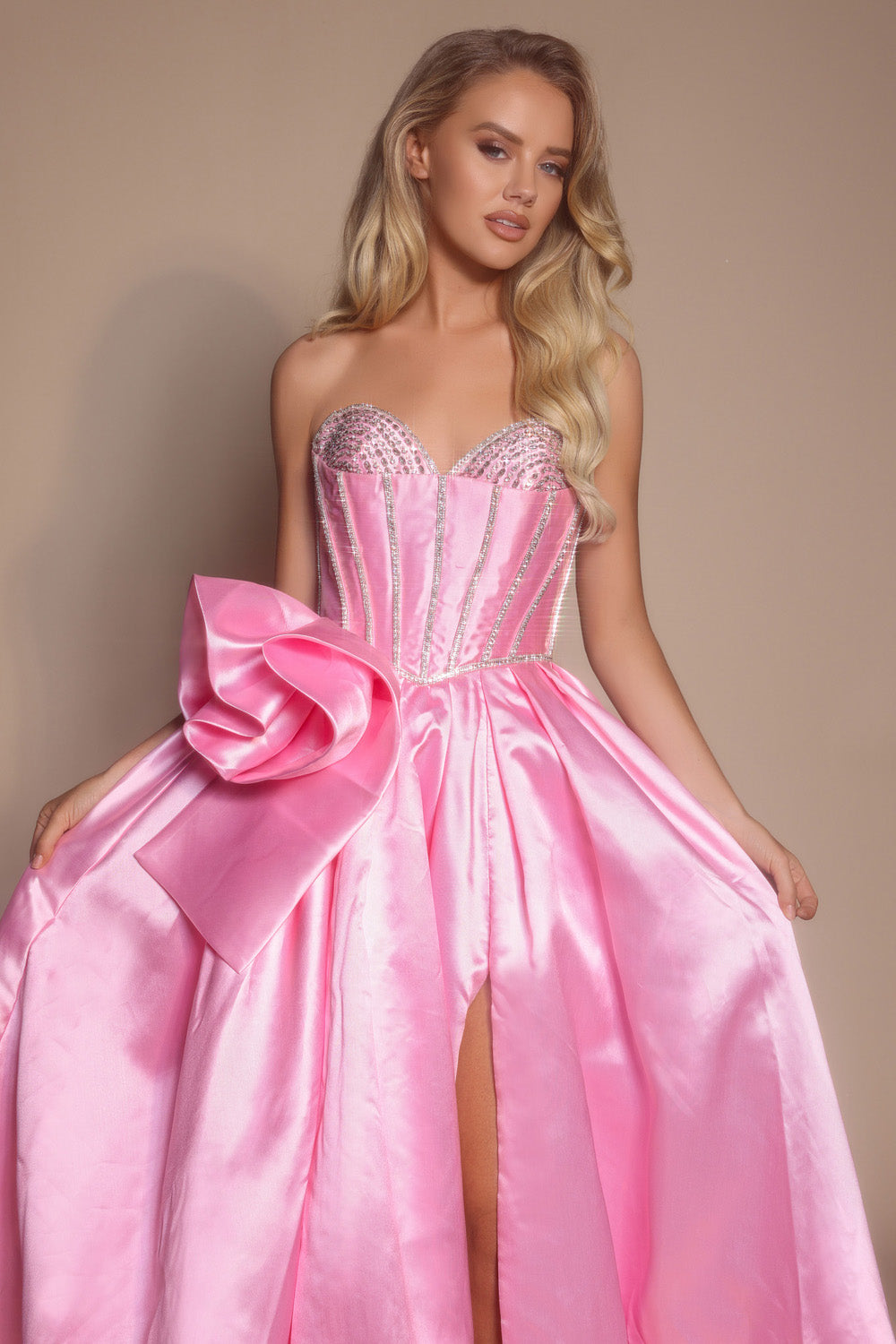 Portia and Scarlett PS26079 Pink prom dress with a fitted bodice, beading, and a side slit.