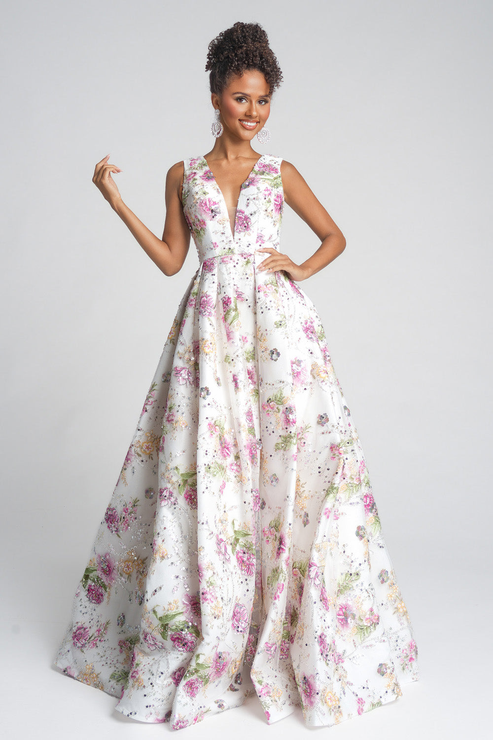 Portia and Scarlett PS26091 White floral prom dress with a deep V-neck and full ballgown silhouette.