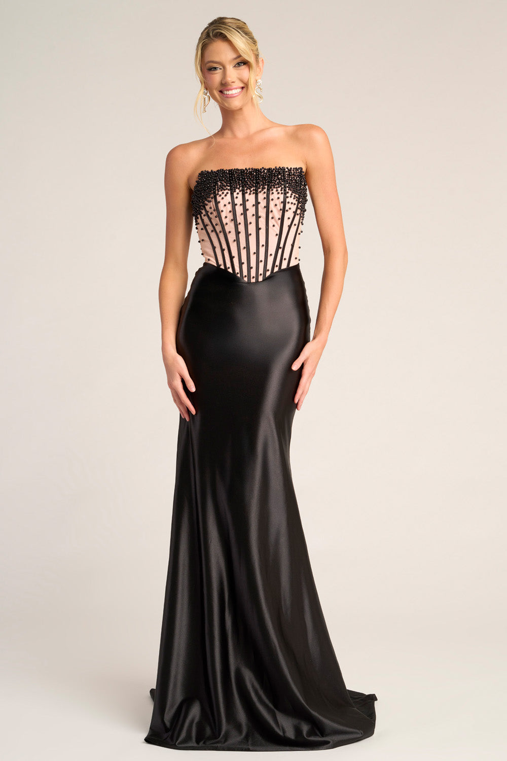 Portia and Scarlett PS26094 Black mermaid prom dress with beaded corset and strapless design.