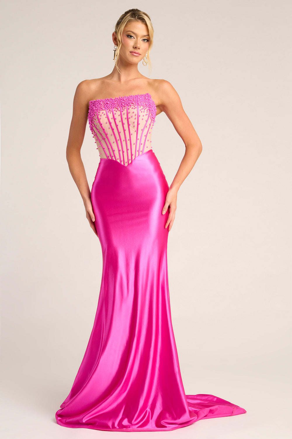 Portia and Scarlett PS26094 Fuchsia mermaid prom dress with beaded corset and strapless design.