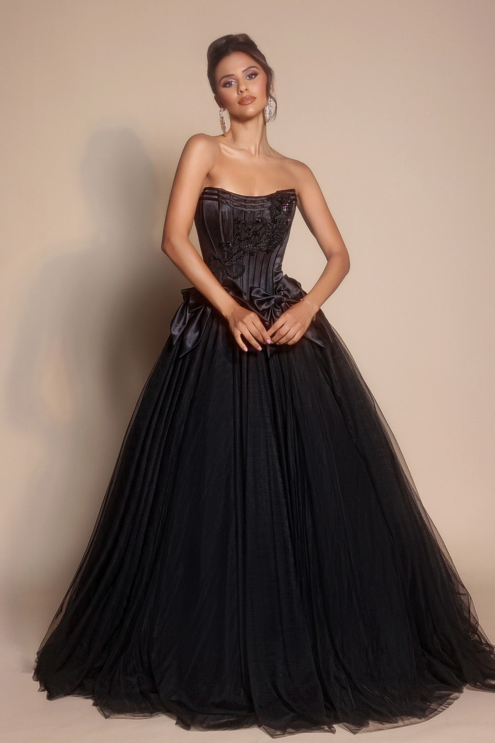 Portia and Scarlett PS26102 Black ballgown prom dress with corset bodice and intricate beading, front view.