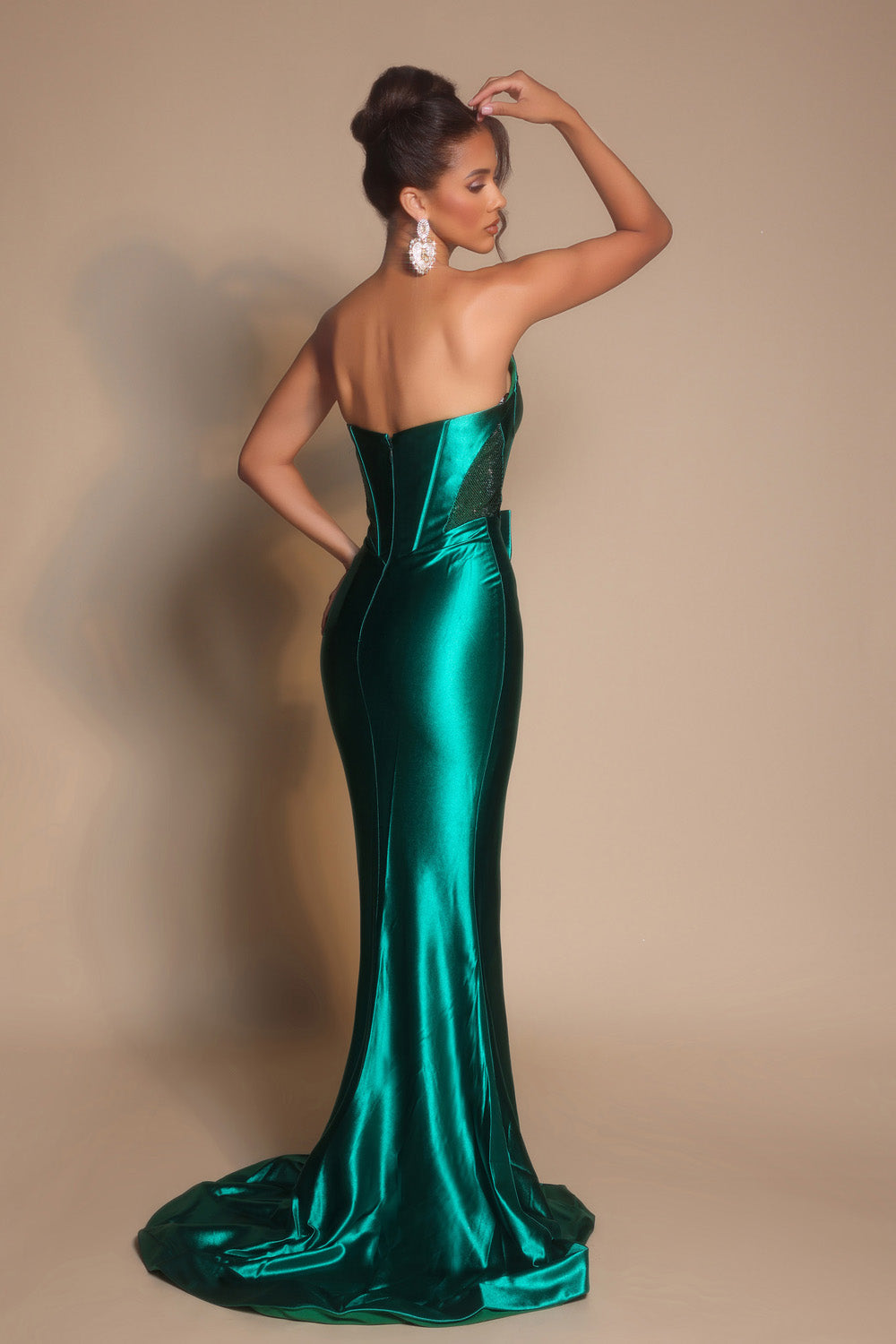Portia and Scarlett PS26136 Emerald mermaid prom dress with a stunning lace-up back, back view.