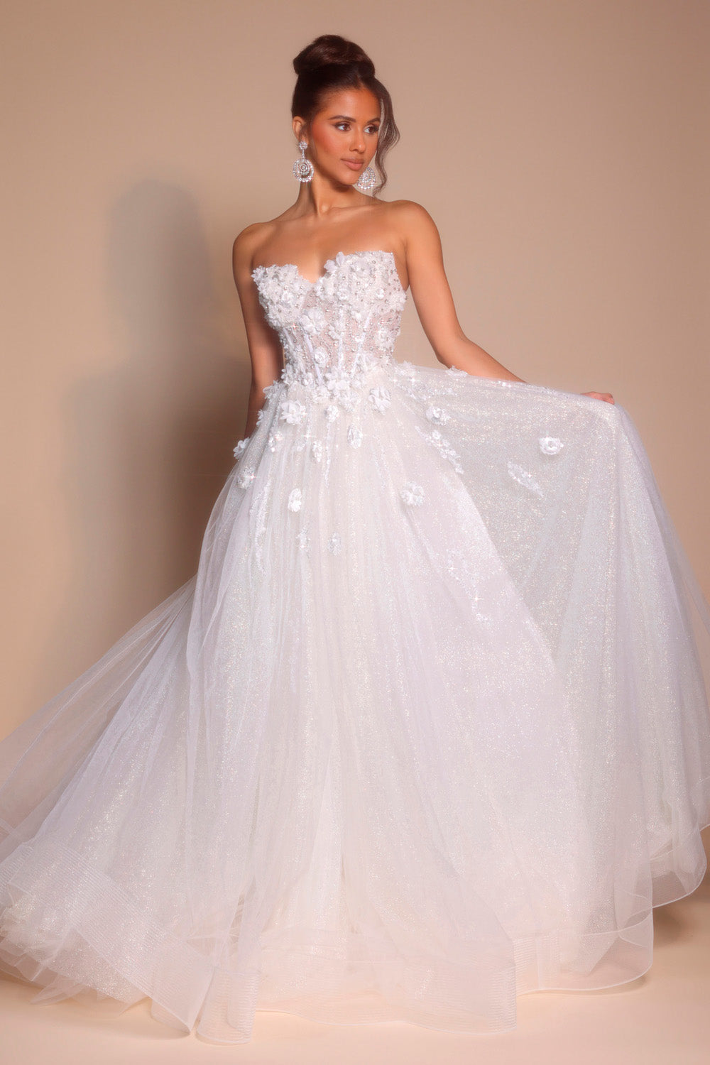Portia and Scarlett PS26137 Ivory ballgown prom dress with floral embellishments and a sparkling tulle skirt.