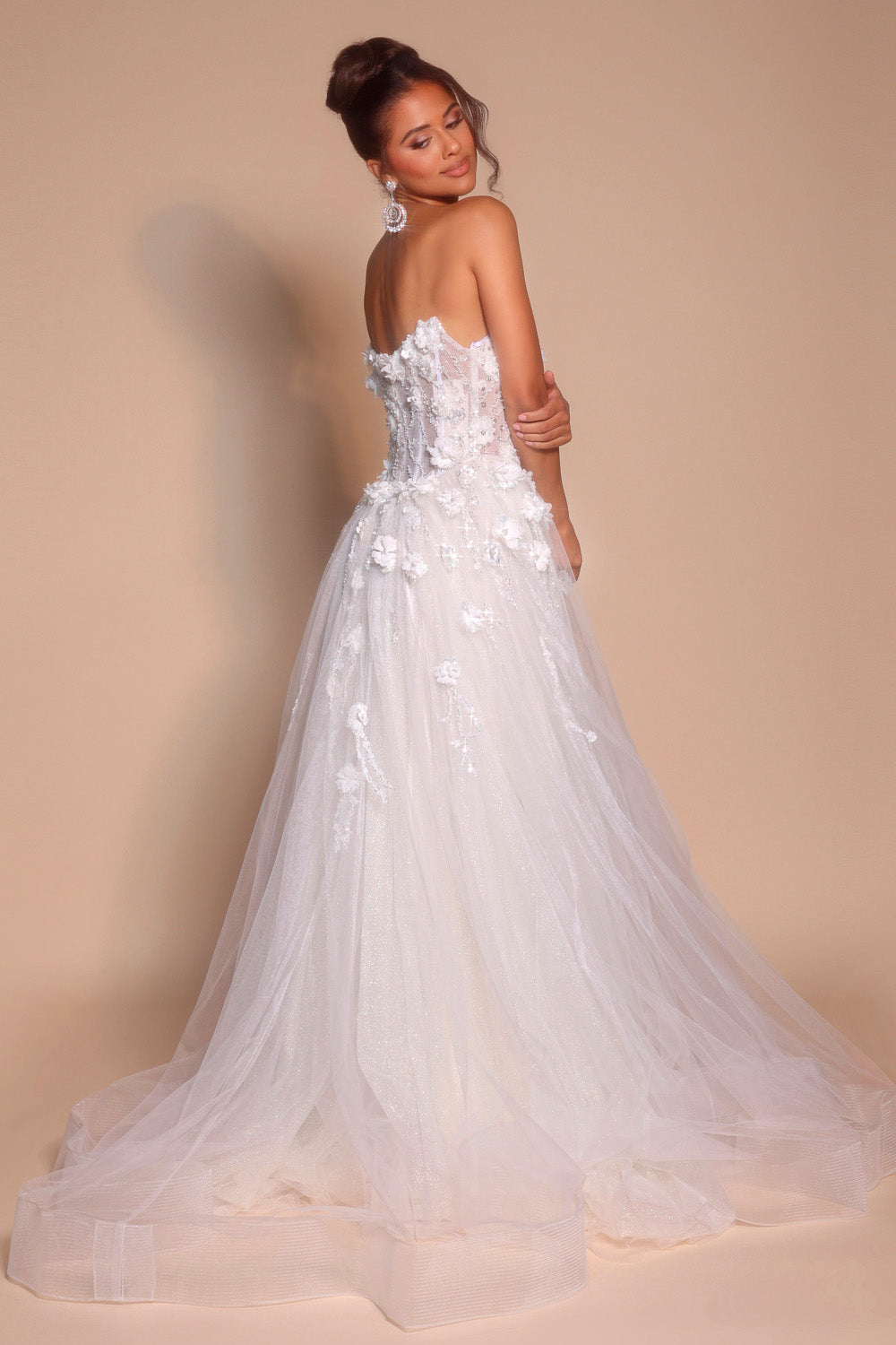 Portia and Scarlett PS26137 Ivory ballgown prom dress with floral embellishments and a lace-up back.