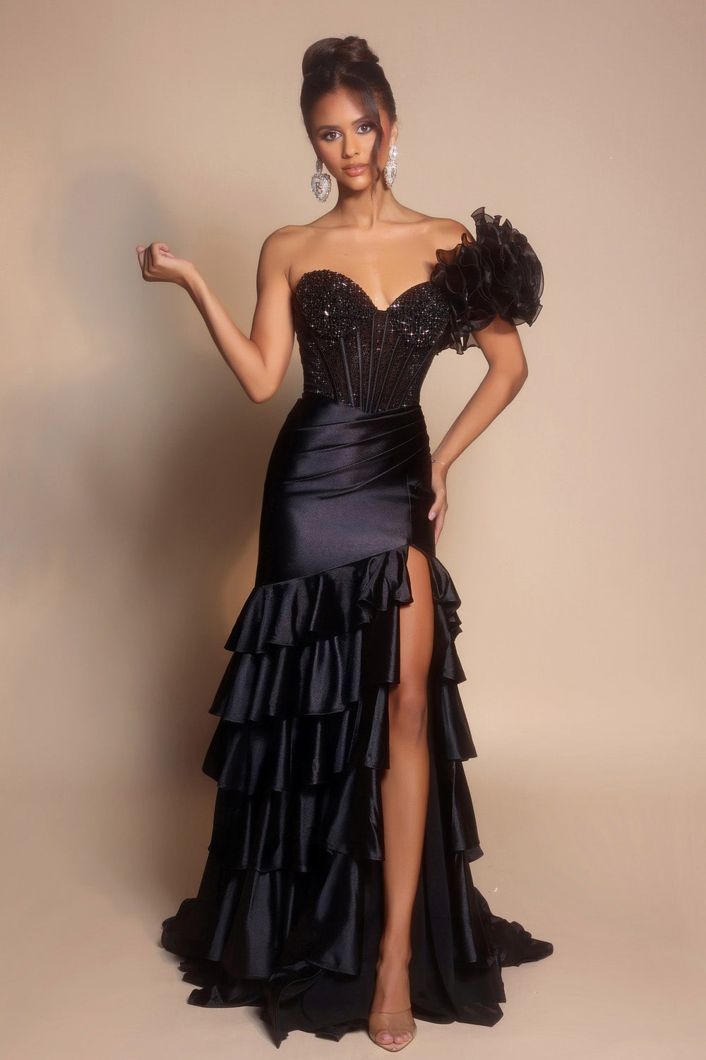 Portia and Scarlett PS26141 Black mermaid prom dress with beaded bodice and high slit detail.