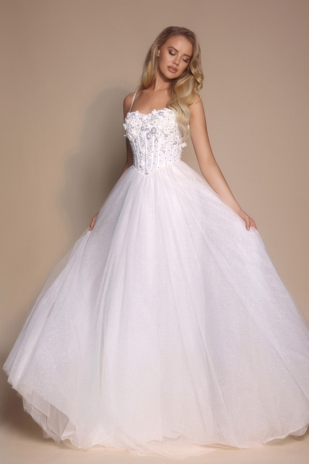 Portia and Scarlett PS26146 Ivory ballgown prom dress with beaded corset and flowing tulle skirt.