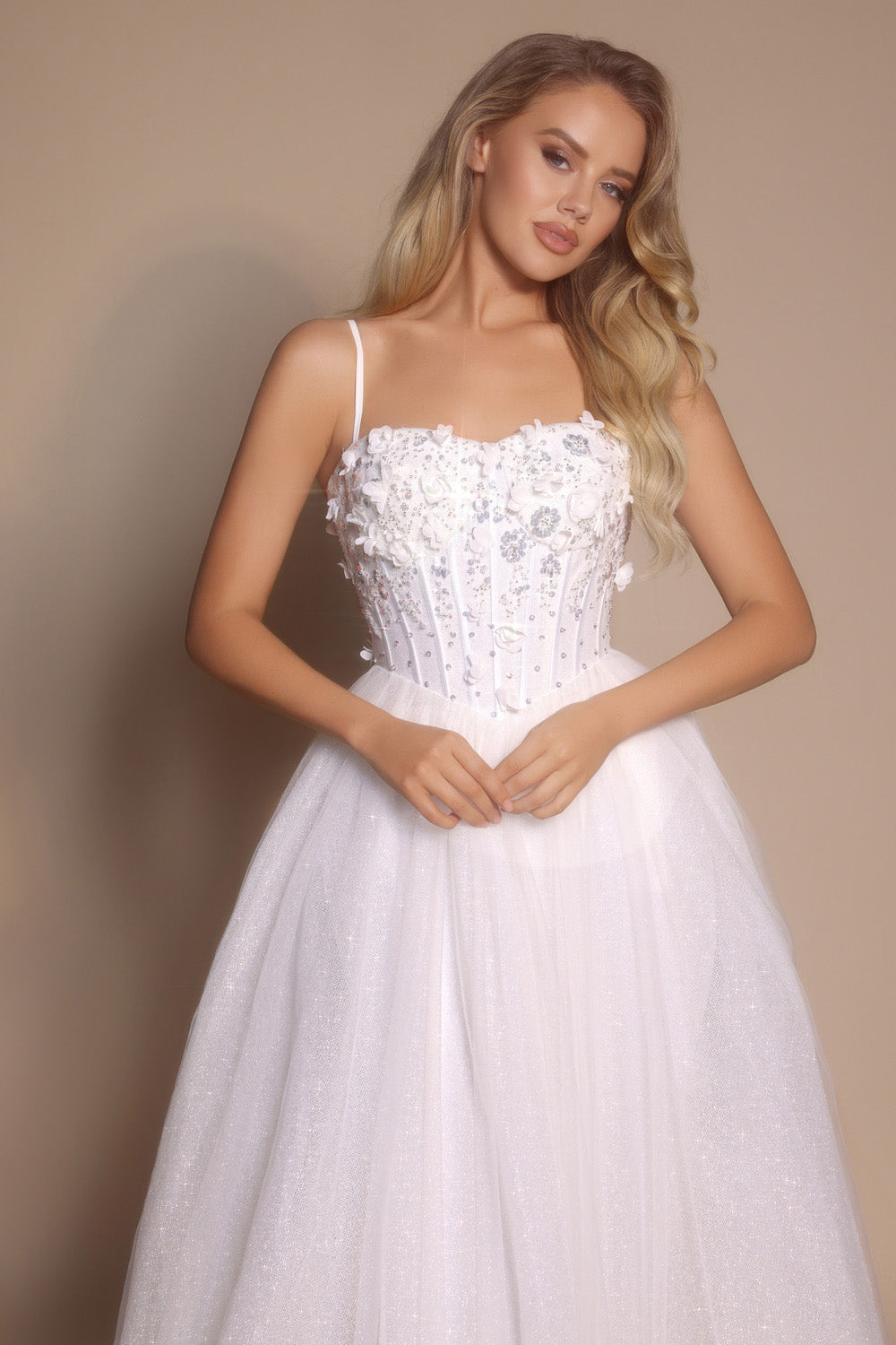 Portia and Scarlett PS26146 Ivory prom dress with a fitted bodice and sparkling beaded details.